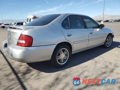 Trzecie zdjęcie samochodu z tyłu: 2001 NISSAN ALTIMA XE VIN:1N4DL01DX1C100266 - miniatura