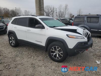 Czwarte zdjęcie samochodu z boku: 2014 JEEP CHEROKEE TRAILHAWK VIN:1C4PJMBS0EW191621 - miniatura