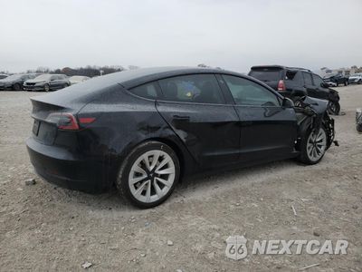 Trzecie zdjęcie samochodu z tyłu: 2023 TESLA MODEL 3 VIN:5YJ3E1EA7PF704634 - miniatura