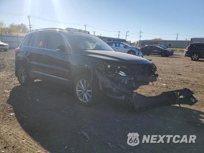 Czwarte zdjęcie samochodu z boku: 2017 VOLKSWAGEN TIGUAN WOLFSBURG VIN:WVGSV7AX6HK023616 - miniatura