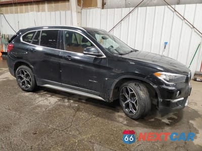 Czwarte zdjęcie samochodu z boku: 2017 BMW X1 XDRIVE28I VIN:WBXHT3C35H5F87284 - miniatura