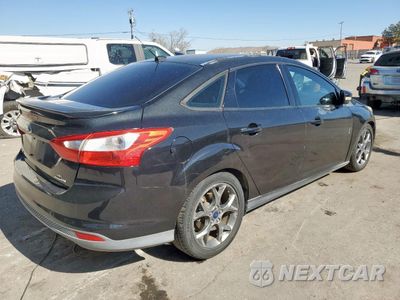 Trzecie zdjęcie samochodu z tyłu: 2014 FORD FOCUS SE VIN:1FADP3F23EL239304 - miniatura