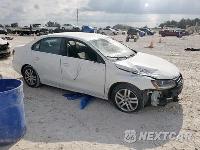 Czwarte zdjęcie samochodu z boku: 2017 VOLKSWAGEN JETTA S VIN:3VW2B7AJ7HM246634 - miniatura