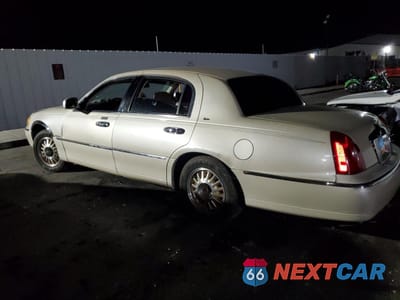 Drugie zdjęcie samochodu z przodu: 1999 LINCOLN TOWN CAR CARTIER VIN:1LNHM83W7XY691721 - miniatura