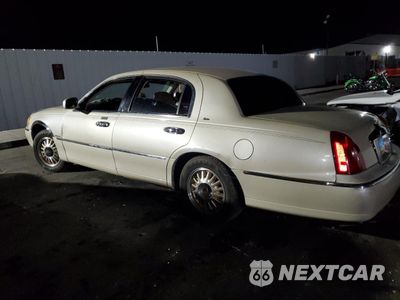Drugie zdjęcie samochodu z przodu: 1999 LINCOLN TOWN CAR CARTIER VIN:1LNHM83W7XY691721 - miniatura