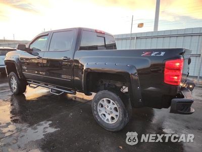 Drugie zdjęcie samochodu z przodu: 2018 CHEVROLET SILVERADO K1500 LT VIN:3GCUKREC0JG515659 - miniatura