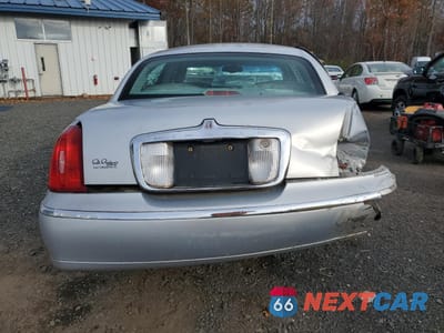 Zdjęcie 6 z 12 samochodu: 2001 LINCOLN TOWN CAR SIGNATURE VIN:1LNHM82W31Y729695 - miniatura