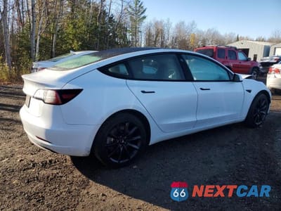 Trzecie zdjęcie samochodu z tyłu: 2023 TESLA MODEL 3 VIN:LRW3E1FA6PC843047 - miniatura