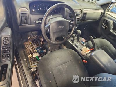 Zdjęcie 8 z 13 samochodu: 2003 JEEP GRAND CHEROKEE LAREDO VIN:1J4GW48S23C560531 - miniatura