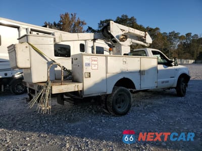 Trzecie zdjęcie samochodu z tyłu: 1999 FORD F450 SUPER DUTY BUCKET TRUCK VIN:1FDXF46FXXEE74790 - miniatura