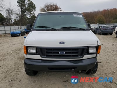 Piąte zdjęcie samochodu w środku: 1999 FORD ECONOLINE E350 SUPER DUTY VAN VIN:1FTSE34L4XHB18497 - miniatura