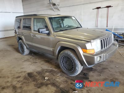Czwarte zdjęcie samochodu z boku: 2006 JEEP COMMANDER VIN:1J8HG48N16C323009 - miniatura