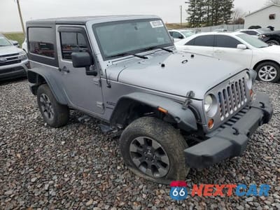 Czwarte zdjęcie samochodu z boku: 2013 JEEP WRANGLER SPORT VIN:1C4AJWAG9DL678685 - miniatura