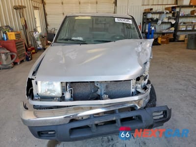 Piąte zdjęcie samochodu w środku: 1999 NISSAN FRONTIER KING CAB XE VIN:1N6DD26SXXC344080 - miniatura