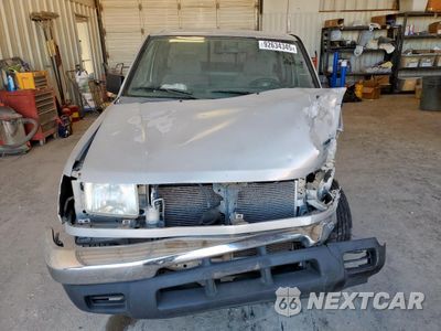 Piąte zdjęcie samochodu w środku: 1999 NISSAN FRONTIER KING CAB XE VIN:1N6DD26SXXC344080 - miniatura