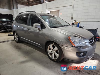 Czwarte zdjęcie samochodu z boku: 2009 KIA RONDO LX VIN:KNAFG526297273060 - miniatura