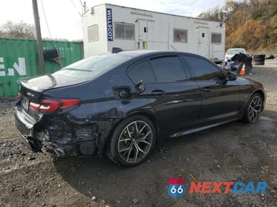 Trzecie zdjęcie samochodu z tyłu: 2022 BMW 530XE VIN:WBA33AG07NCK31223 - miniatura