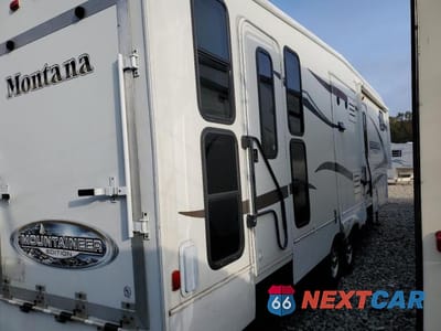 Czwarte zdjęcie samochodu z boku: 2010 KEYSTONE MONTANA CAMPER VIN:4YDF34729AR731309 - miniatura