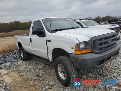Trzecie zdjęcie samochodu z tyłu: 1999 FORD F250 SUPER DUTY VIN:1FTNF21L8XEA44771 - miniatura