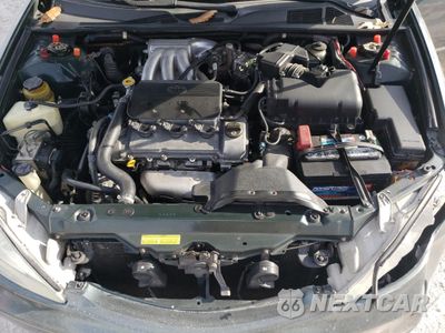 Zdjęcie 11 z 14 samochodu: 2002 TOYOTA CAMRY LE VIN:4T1BF32K52U506468 - miniatura
