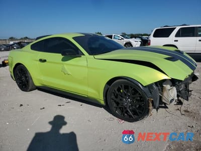 Czwarte zdjęcie samochodu z boku: 2019 FORD MUSTANG VIN:1FA6P8TH3K5181211 - miniatura