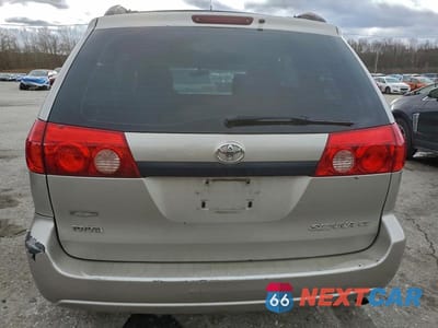 Zdjęcie 6 z 13 samochodu: 2010 TOYOTA SIENNA CE VIN:5TDKK4CC5AS293764 - miniatura