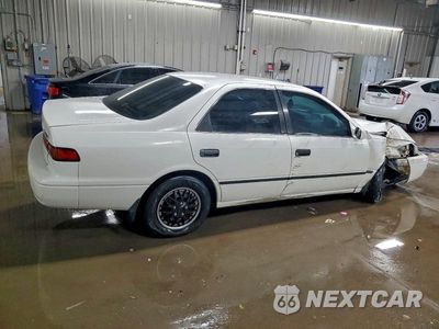 Trzecie zdjęcie samochodu z tyłu: 1999 TOYOTA CAMRY LE VIN:JT2BG22K5X0374668 - miniatura