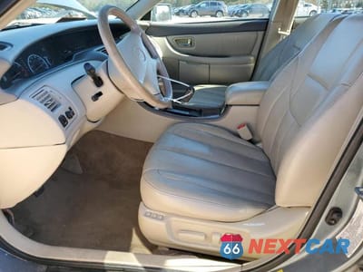 Zdjęcie 7 z 13 samochodu: 2000 TOYOTA AVALON VIN:4T1BF28B0YU074110 - miniatura