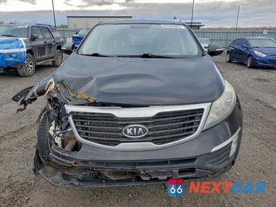 Piąte zdjęcie samochodu w środku: 2011 KIA SPORTAGE LX VIN:KNDPB3A2XB7065054 - miniatura