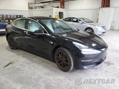 Czwarte zdjęcie samochodu z boku: 2019 TESLA MODEL 3 VIN:5YJ3E1EB9KF194983 - miniatura