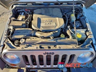 Zdjęcie 12 z 13 samochodu: 2013 JEEP WRANGLER UNLIMITED SPORT VIN:1C4HJWDG6DL682350 - miniatura