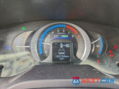 Zdjęcie 9 z 14 samochodu: 2010 HONDA INSIGHT LX VIN:JHMZE2H56AS007558 - miniatura