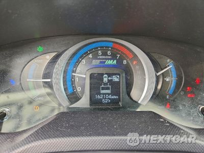 Zdjęcie 9 z 14 samochodu: 2010 HONDA INSIGHT LX VIN:JHMZE2H56AS007558 - miniatura