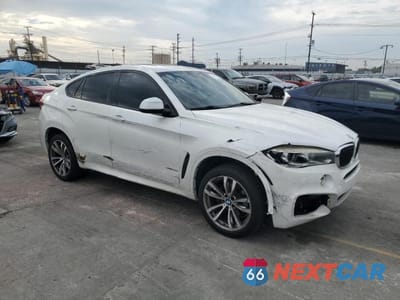 Czwarte zdjęcie samochodu z boku: 2016 BMW X6 SDRIVE35I VIN:5UXKU0C54G0F92406 - miniatura