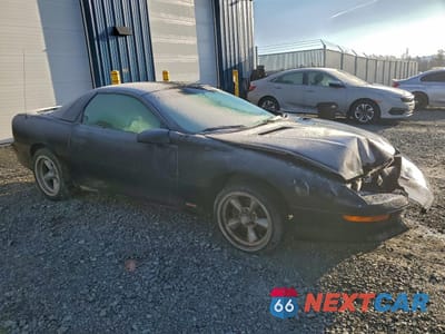 Czwarte zdjęcie samochodu z boku: 1997 CHEVROLET CAMARO Z28 VIN:2G1FP22P2V2113779 - miniatura