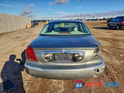 Zdjęcie 6 z 14 samochodu: 2000 LINCOLN CONTINENTAL VIN:1LNHM97V8YY892407 - miniatura