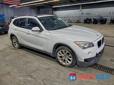 Czwarte zdjęcie samochodu z boku: 2014 BMW X1 XDRIVE28I VIN:WBAVL1C56EVY18057 - miniatura