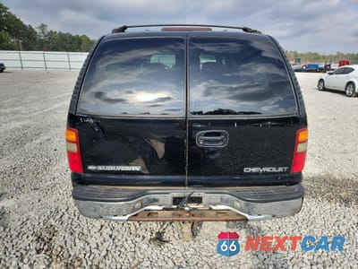 Zdjęcie 6 z 15 samochodu: 2001 CHEVROLET SUBURBAN C1500 VIN:3GNEC16T71G178951 - miniatura