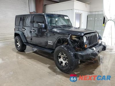 Czwarte zdjęcie samochodu z boku: 2013 JEEP WRANGLER UNLIMITED SPORT VIN:1C4BJWDG5DL539119 - miniatura