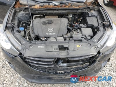 Zdjęcie 11 z 12 samochodu: 2016 MAZDA CX-5 TOURING VIN:JM3KE2CY9G0898817 - miniatura