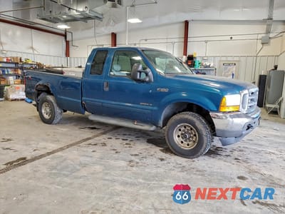 Czwarte zdjęcie samochodu z boku: 2001 FORD F350 SRW SUPER DUTY VIN:1FTSX31F91EB92614 - miniatura