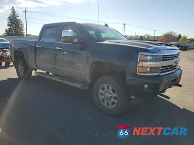 Czwarte zdjęcie samochodu z boku: 2017 CHEVROLET SILVERADO K3500 HIGH COUNTRY VIN:1GC4K1EY9HF225459 - miniatura