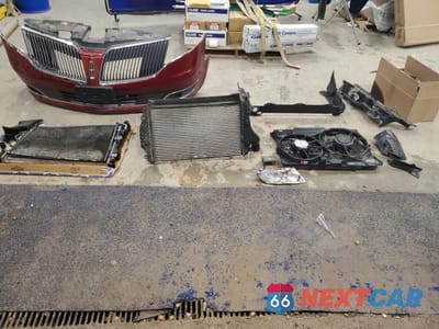 Zdjęcie 13 z 14 samochodu: 2013 LINCOLN MKT VIN:2LMHJ5AT5DBL51352 - miniatura