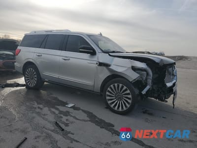 Czwarte zdjęcie samochodu z boku: 2019 LINCOLN NAVIGATOR RESERVE VIN:5LMJJ2LTXKEL17379 - miniatura