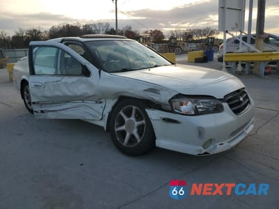 Czwarte zdjęcie samochodu z boku: 2001 NISSAN MAXIMA GXE VIN:JN1CA31D71T611868 - miniatura