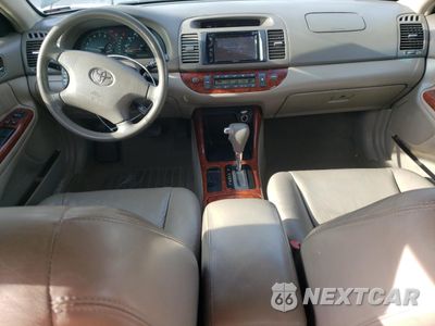 Zdjęcie 8 z 14 samochodu: 2002 TOYOTA CAMRY LE VIN:4T1BF32K52U506468 - miniatura