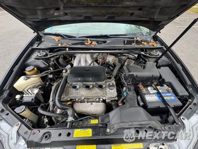 Zdjęcie 7 z 13 samochodu: 2002 TOYOTA CAMRY LE VIN:4T1BF30K42U013318 - miniatura