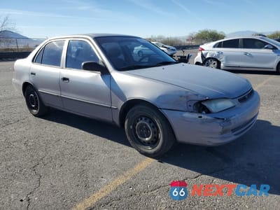 Czwarte zdjęcie samochodu z boku: 1998 TOYOTA COROLLA VE VIN:1NXBR12EXWZ091191 - miniatura