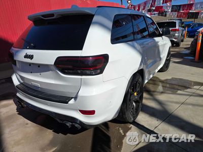 Czwarte zdjęcie samochodu z boku: 2019 JEEP GRAND CHEROKEE TRACKHAWK VIN:1C4RJFN98KC754750 - miniatura