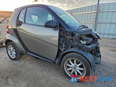 Czwarte zdjęcie samochodu z boku: 2009 SMART FORTWO PURE VIN:WMEEJ31X19K289019 - miniatura